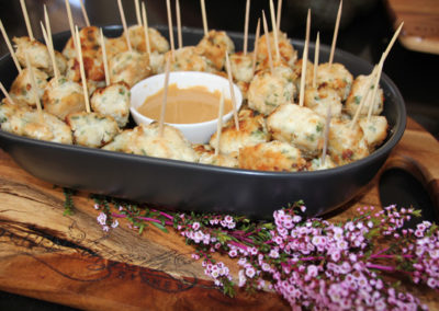 Chicken and corriander balls with peanut dipping sauce