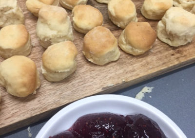 Homemade scones with cream and jam